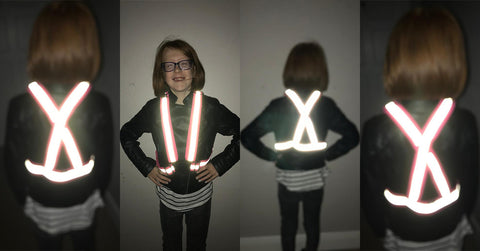 Girl wearing high vis reflective sash